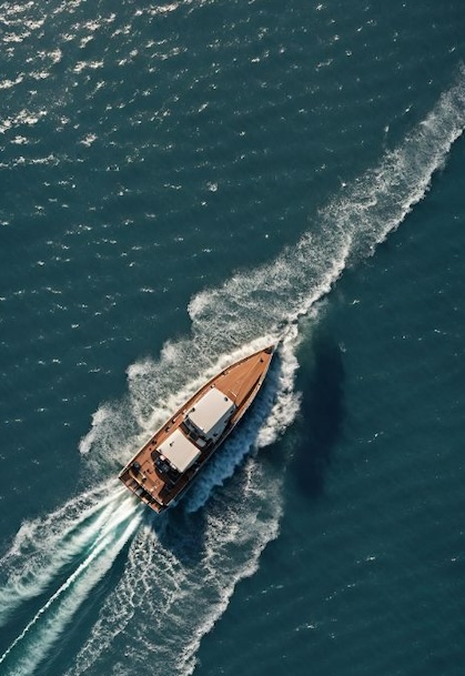 A tug boat in the ocean representing FortyTwo Security navigating the waves for your company.